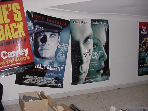 Posters on the back wall of the office