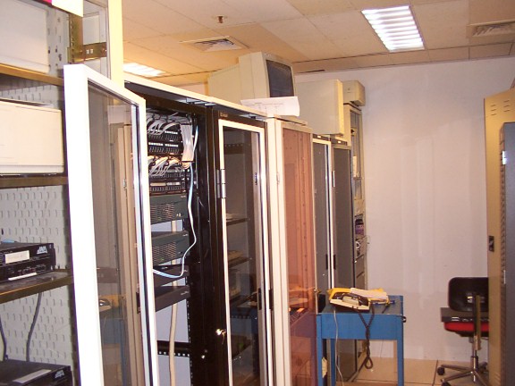 Cabinets in the back row of comms room.  