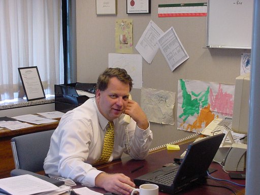 John working at his desk