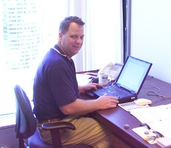 John Detering in the office