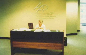 Ann at the reception desk