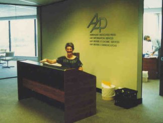 Judy at the reception desk